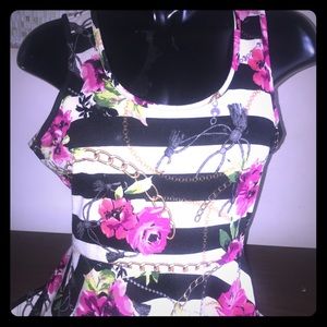 Sleeveless peplum shirt.